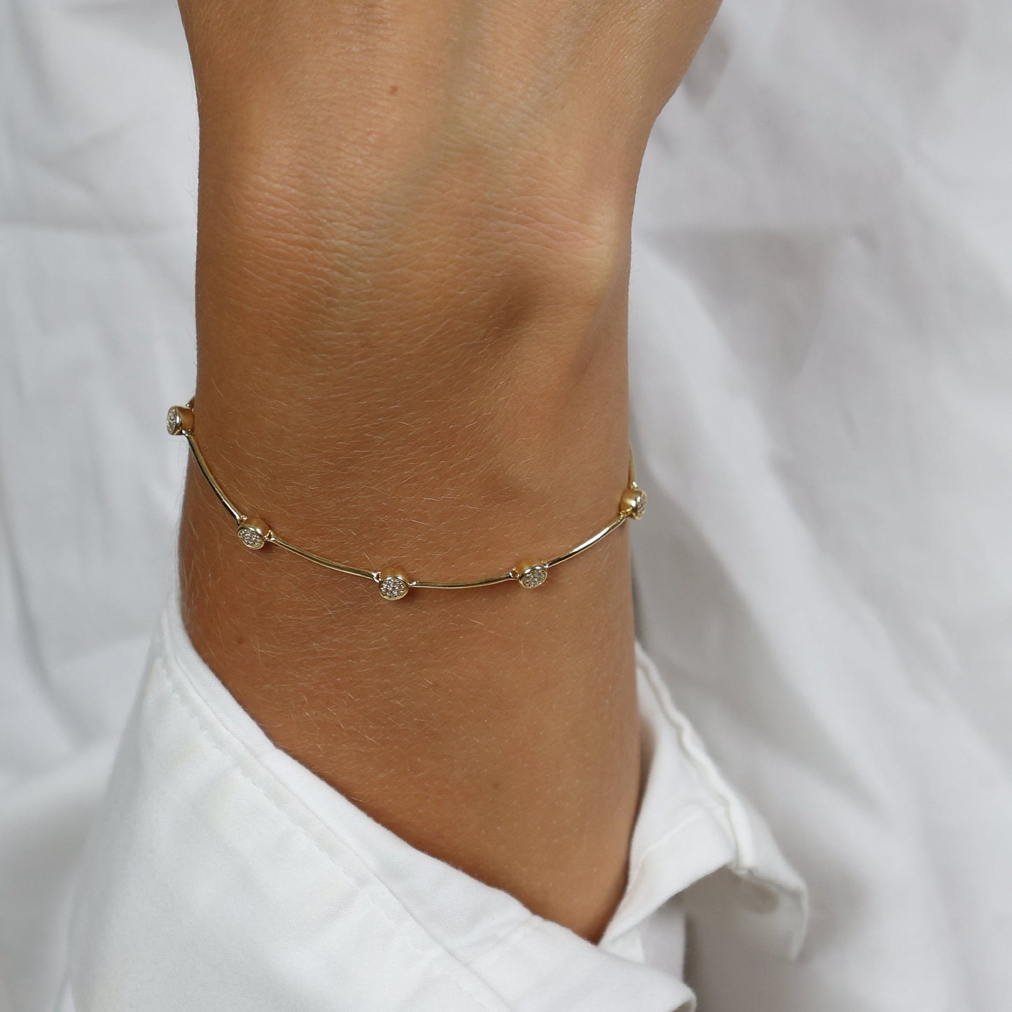 Armbånd 14 Karat Guld 19 CM med 70x0,00214 ct W/SI Diamanter