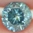 0.77 Carat Round Diamond - Fancy Vivid Blue Color